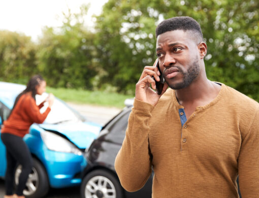 Male,Motorist,Involved,In,Car,Accident,Calling,Insurance,Company,Or